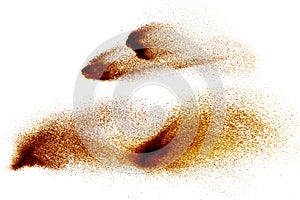 Abstract brown colored sand splash on white background. photo