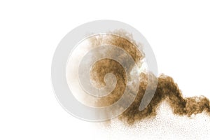 Abstract brown dust explosion on white background.