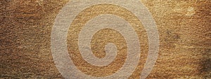 Abstract brown stone wall, background - in the form of a rough embossed stone surface