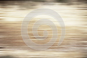 Abstract brown wooden background with motion blurred effect for insert texts