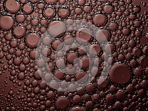 Abstract bubble background in desaturated red. Slightly blurred and selective focus.