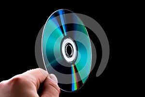 Abstract cd dvd blue-ray disk in hand