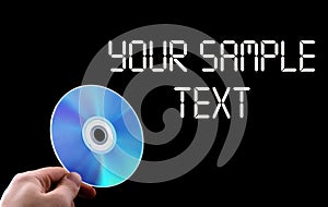 Abstract cd dvd blue-ray disk in hand