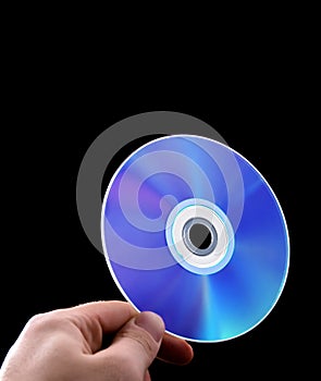 Abstract cd dvd blue-ray disk in hand