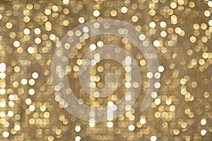 Abstract Christmas blurry background of glowing Golden lights