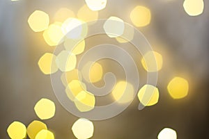 abstract Christmas Golden bokeh lights on grey background