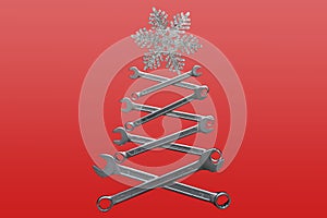 Abstract christmas tree made of wrenches with snowflate on the top on red background. Industrial christmas, winter, new year conce