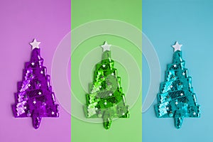 Abstract Christmas trees differet colors. Minimal creative for the New Year holidays