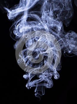 Abstract cigar smoke on black