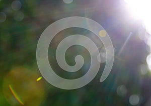 Abstract circles from the sun and lens flare - background