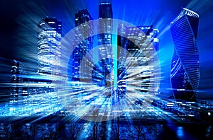 Abstract cityscape traffic background with motion blur, art toning. Moving through modern city street with illuminated