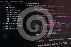 Abstract close-up of colorful programming code on dark screen, representing software development, digital logic, data processing,