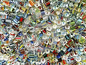 Abstract, close up of colorful, shiny, square glass beads