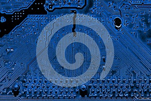 Abstract close up of Electronic Circuits in Technology on Mainboard computer background photo