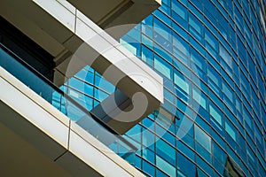 Abstract close-up of a modern glass building with reflective windows