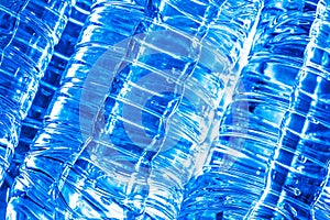 abstract close up pile of plastic water bottles