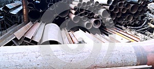 Abstract close up of a stack of steel pipes