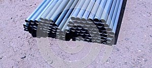 Abstract close up of a stack of steel pipes