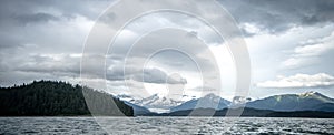 Abstract cloudy waterscape AND MOUNTAIN RANGE IN ALASKA