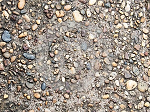 abstract cobblestone pattern emerges in the macro view the concrete background texture, revealing fascinating blend of organic