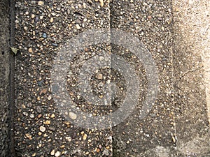 abstract cobblestone pattern emerges in the macro view the concrete background texture, revealing fascinating blend of organic