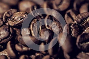 Abstract coffee beans together, close up, macro photography, dark concept
