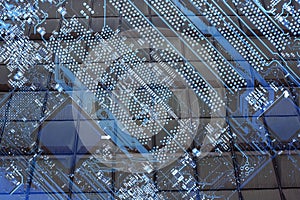 Abstract collage of electronic circuit boards toned in blue