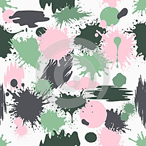 Abstract color splash, seamless pattern. Dirty spots spray paint on a white background.