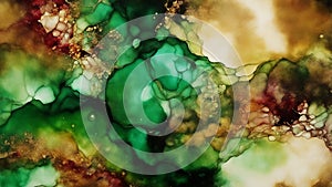 Abstract colored background of green and gold. The alcohol ink painting technique is modern and has a luxurious look.