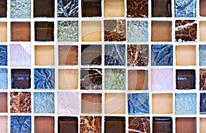 Abstract colored background with small square glass and ceramic tiles