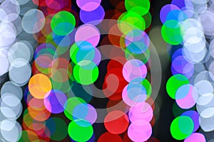 Abstract colored bokeh light on black background