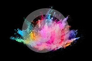 Abstract colored dust explosion on a black background.