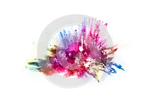 Abstract colored dust explosion on white background.