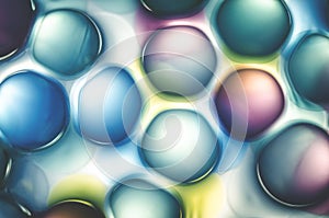 Abstract colored microspheres cells in liquid, background