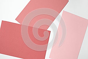 Abstract colored paper texture background. Geometric shapes in colorful and pastel pink, blue, navy colors