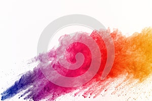 Abstract of colored powder explosion on white background. Multicolor powder splatted isolate. Colorful cloud. Colorful dust explod photo
