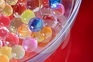 Abstract colorful balls in glass bawl