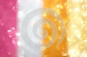 Abstract colorful glitter bokeh lights. defocused lights background.