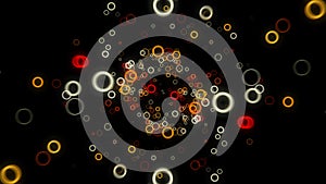 Abstract colorful rings flowing slowly towards the camera on black background, seamless loop. Animation. Yellow and photo