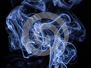 Abstract colorful smoke isolated on black background, fire design
