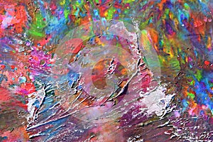 Abstract and colorful texture created from melted colored crayons