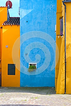 Abstract colorful walls and windows of the old houses. Copy space