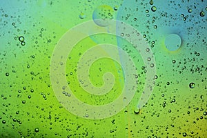 Abstract colourful creative macro oil and water background with bubbles