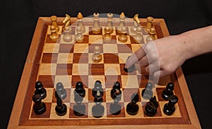 Abstract composition of chess figures. Isolated on black background,children`s mat