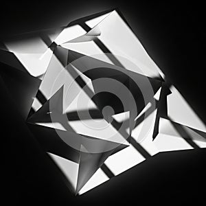 Abstract composition featuring angular, folded white