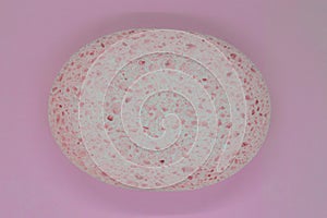 Abstract composition of pink sponge on pink background surface