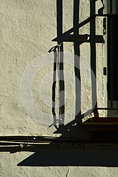 Abstract composition with window grille and shadows