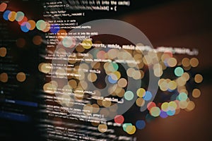 Abstract computer script code. Programming code screen of software developer. Software Programming Work Time. Code text written