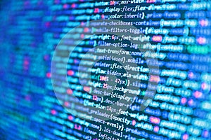 Abstract computer script  code. Web programming and bracket technology background. Writing programming code on laptop. Css3 code