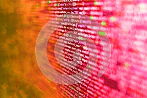 Abstract computer script source code. Shallow depth of field, selective focus effect. Data bits computer bits, shadow and dark